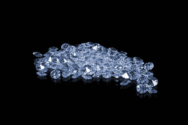 “brilliant gems, jewellery, isolated on black background”